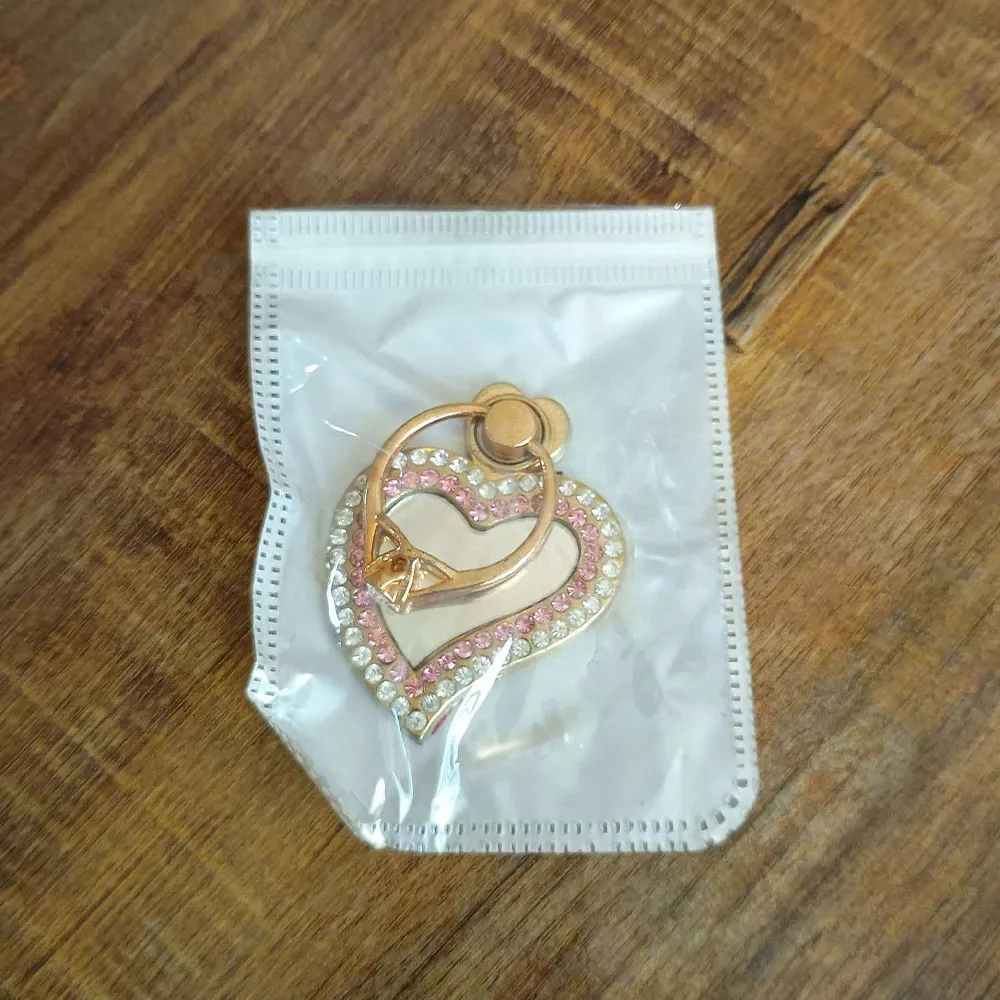 Golden Heart Ring Grip , Golden Heart Ring Grip for sale , Golden Heart Ring Grip for Sale in Pakistan , Golden Heart Ring Grip Available in Pakistan , Golden Heart Ring Grip in lowest price